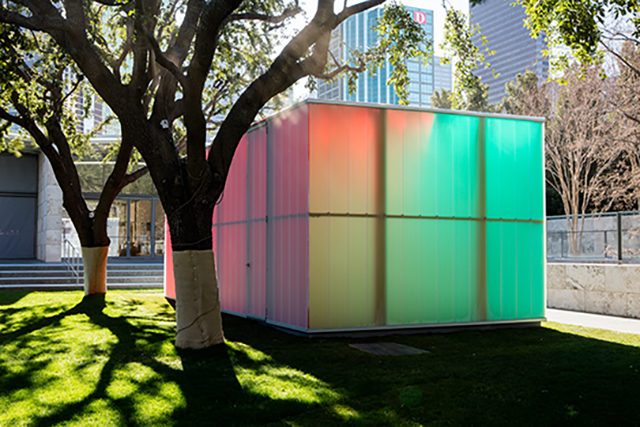 A multicolored box that is a sculpture by Ann Veronica Janssens titled 'Blue, Red and Yellow