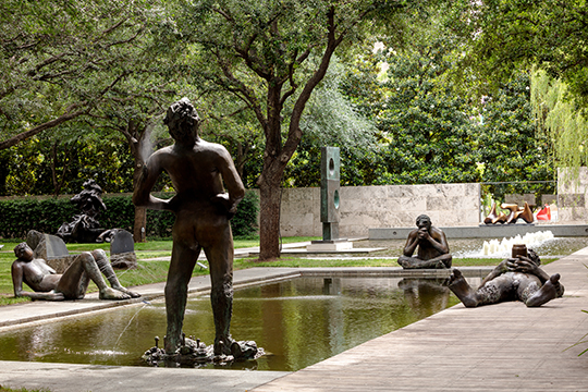 Four figures from Nicole Eisenman's 'Sketch for a Fountain' surround the Nasher fountain
